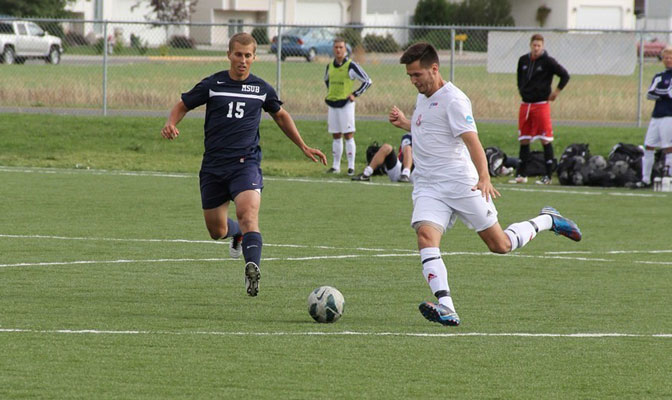 Magnus Kristensen (right) supplied the assist on Simon Fraser's game-tying goal against UC San Diego in the 87th minute. The Clan won 4-3 in a PK shootout to advance to the Elite Eight.